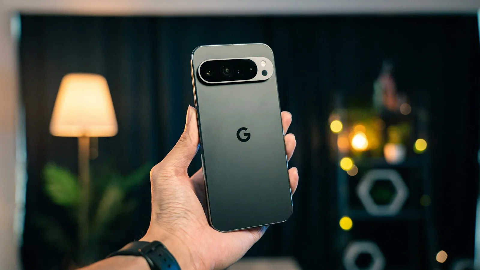 A hand holding a Google Pixel phone